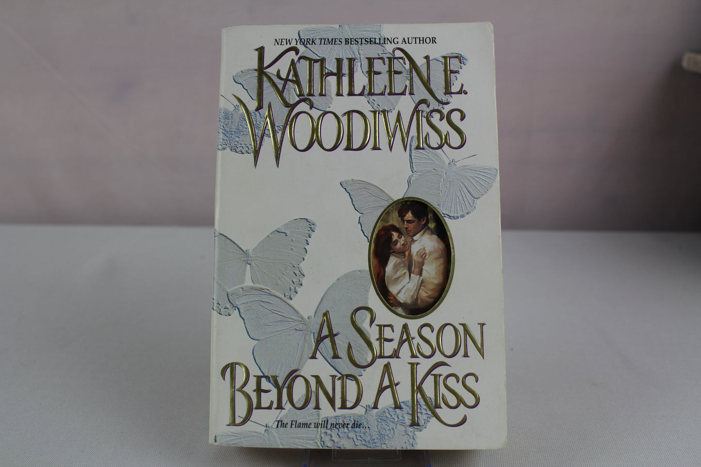 A Season Beyond a Kiss by Kathleen E. Woodiwiss