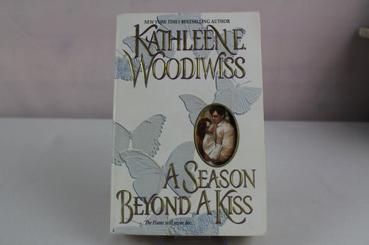 A Season Beyond a Kiss by Kathleen E. Woodiwiss