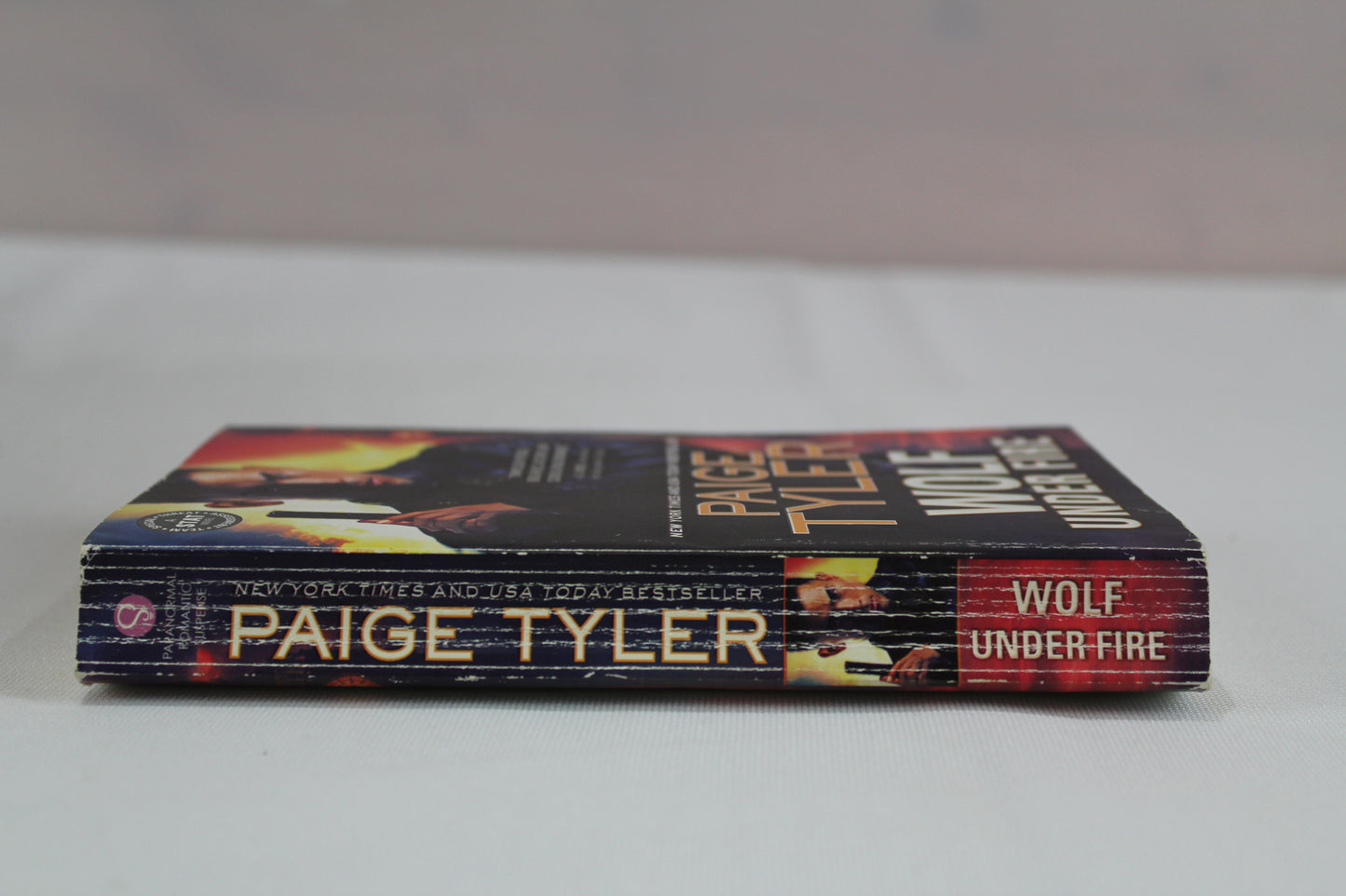Wolf Under Fire: An Alpha Shifter Teams up with a Mistrustful Woman in a Globe-Crossing Adventure of Love and Intrigue (STAT, 1) by Paige Tyler