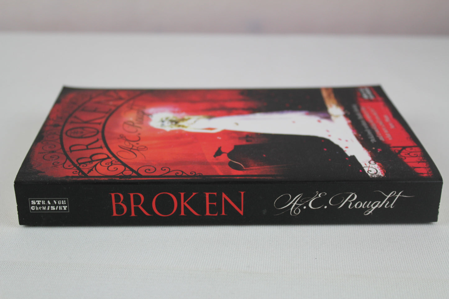 Broken by A.E. Rought