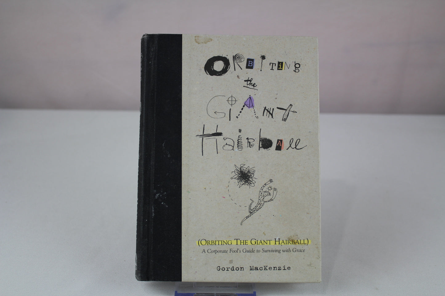 Orbiting the Giant Hairball: A Corporate Fool's Guide to Surviving with Grace by Gordon MacKenzie