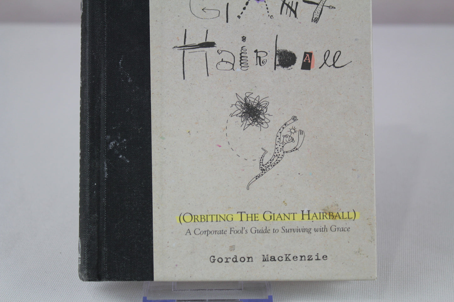Orbiting the Giant Hairball: A Corporate Fool's Guide to Surviving with Grace by Gordon MacKenzie