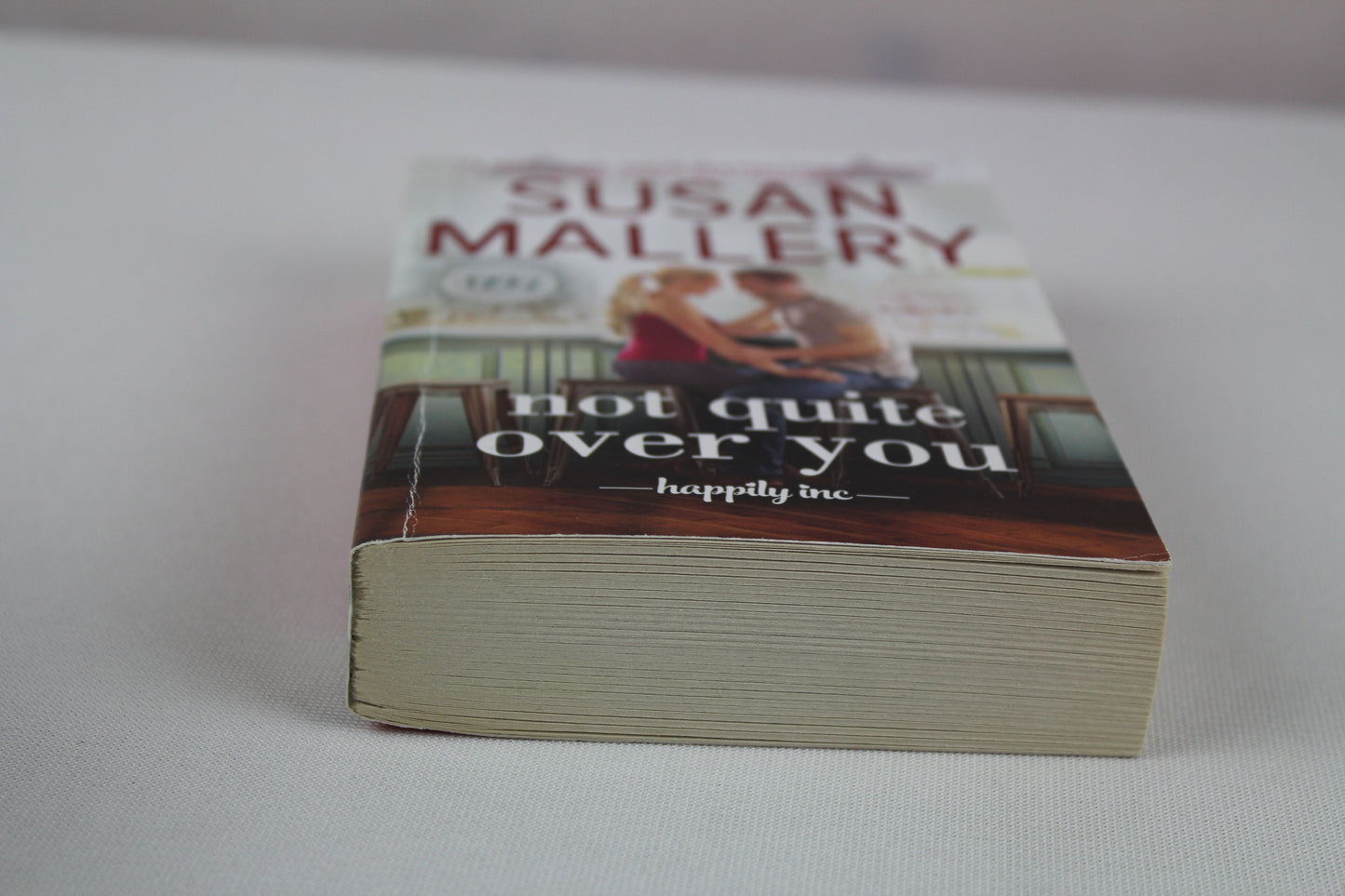 Not Quite Over You: A Gripping Contemporary Romance Novel of Small Town Secrets and Second Chances (Happily Inc, 4) by Susan Mallery
