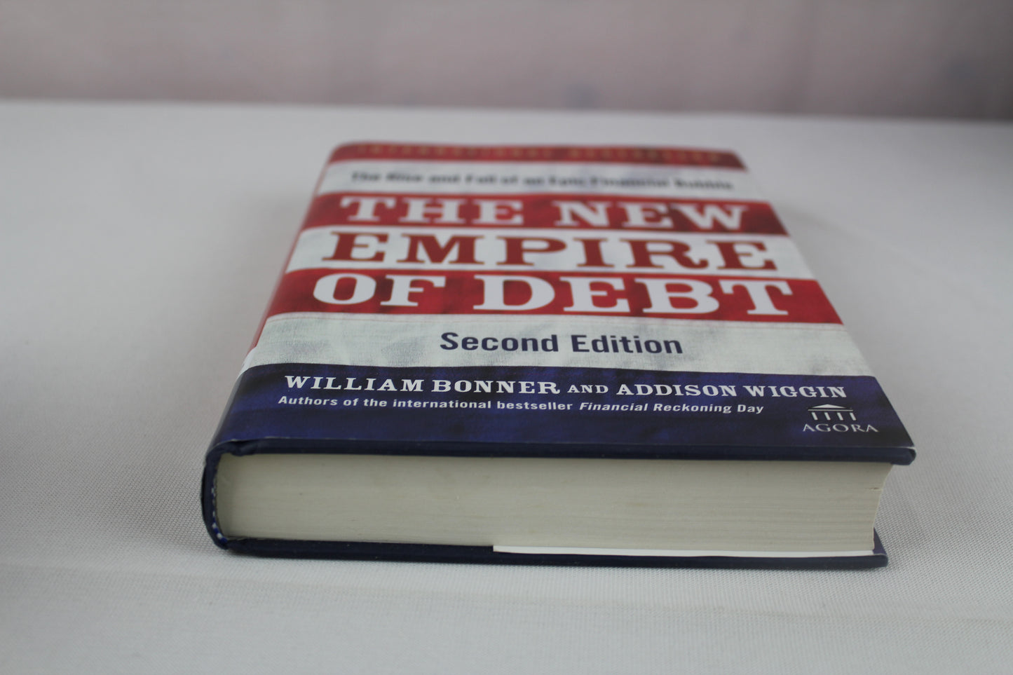 The New Empire of Debt: The Rise and Fall of an Epic Financial Bubble (Agora Series) by William Bonner, Addison Wiggin, Agora