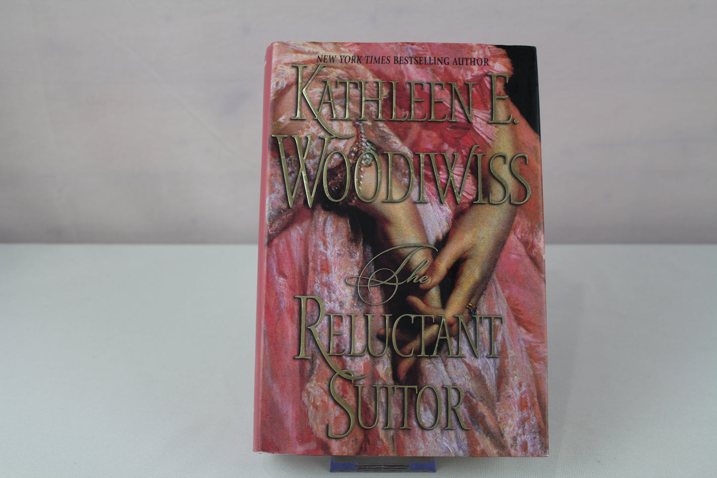 The Reluctant Suitor by Kathleen E. Woodiwiss