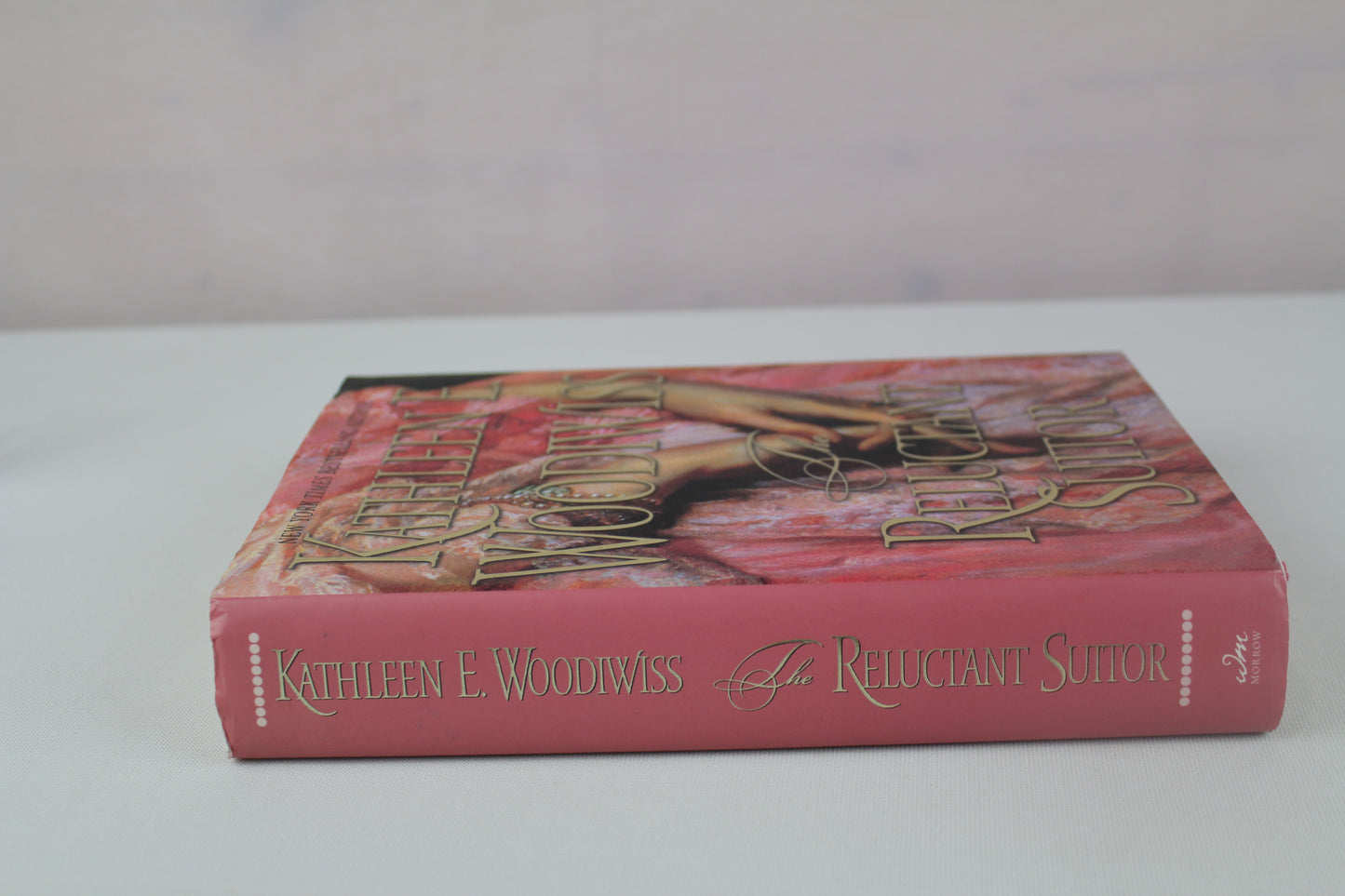 The Reluctant Suitor by Kathleen E. Woodiwiss