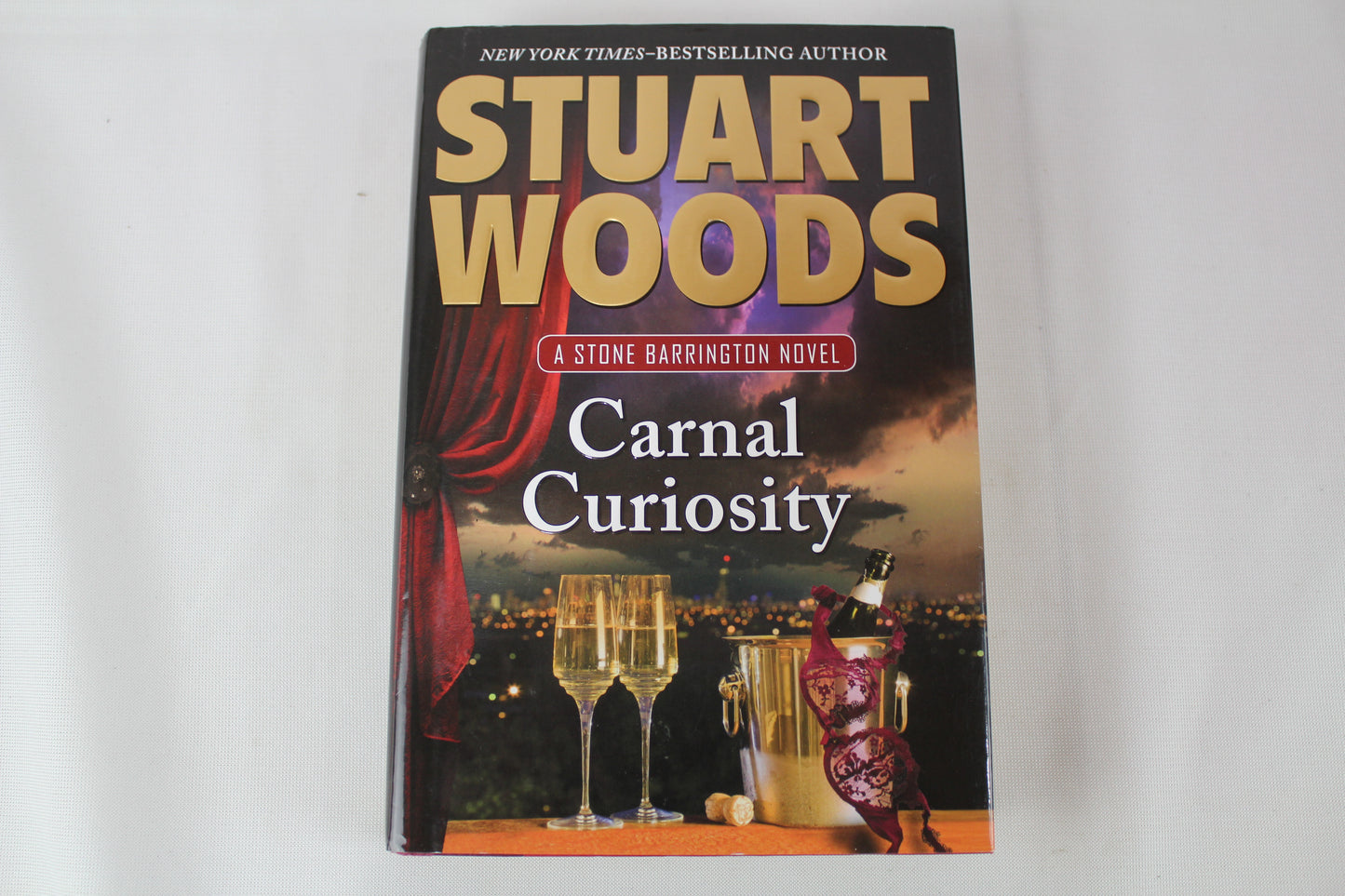 Carnal Curiosity (A Stone Barrington Novel) by Stuart Woods