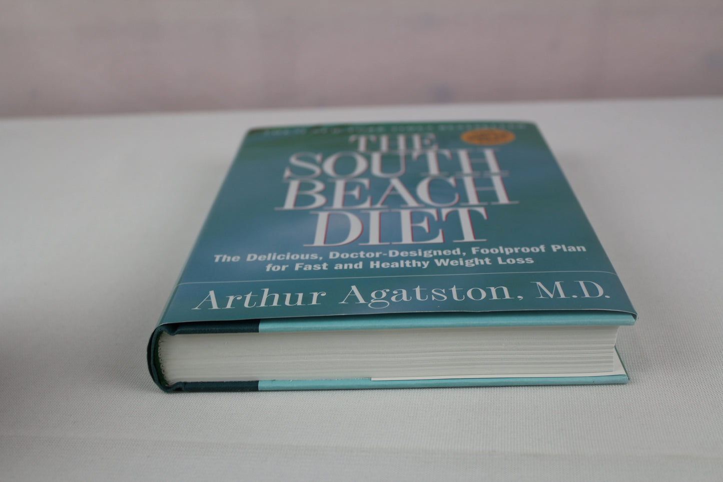 The South Beach Diet: The Delicious, Doctor-Designed, Foolproof Plan for Fast and Healthy Weight Loss by Arthur Agatston