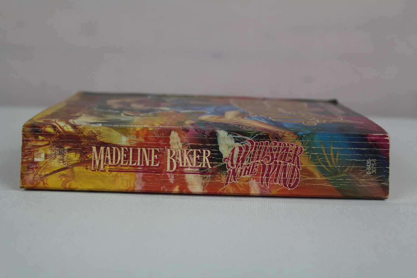 A Whisper in the Wind by Madeline Baker