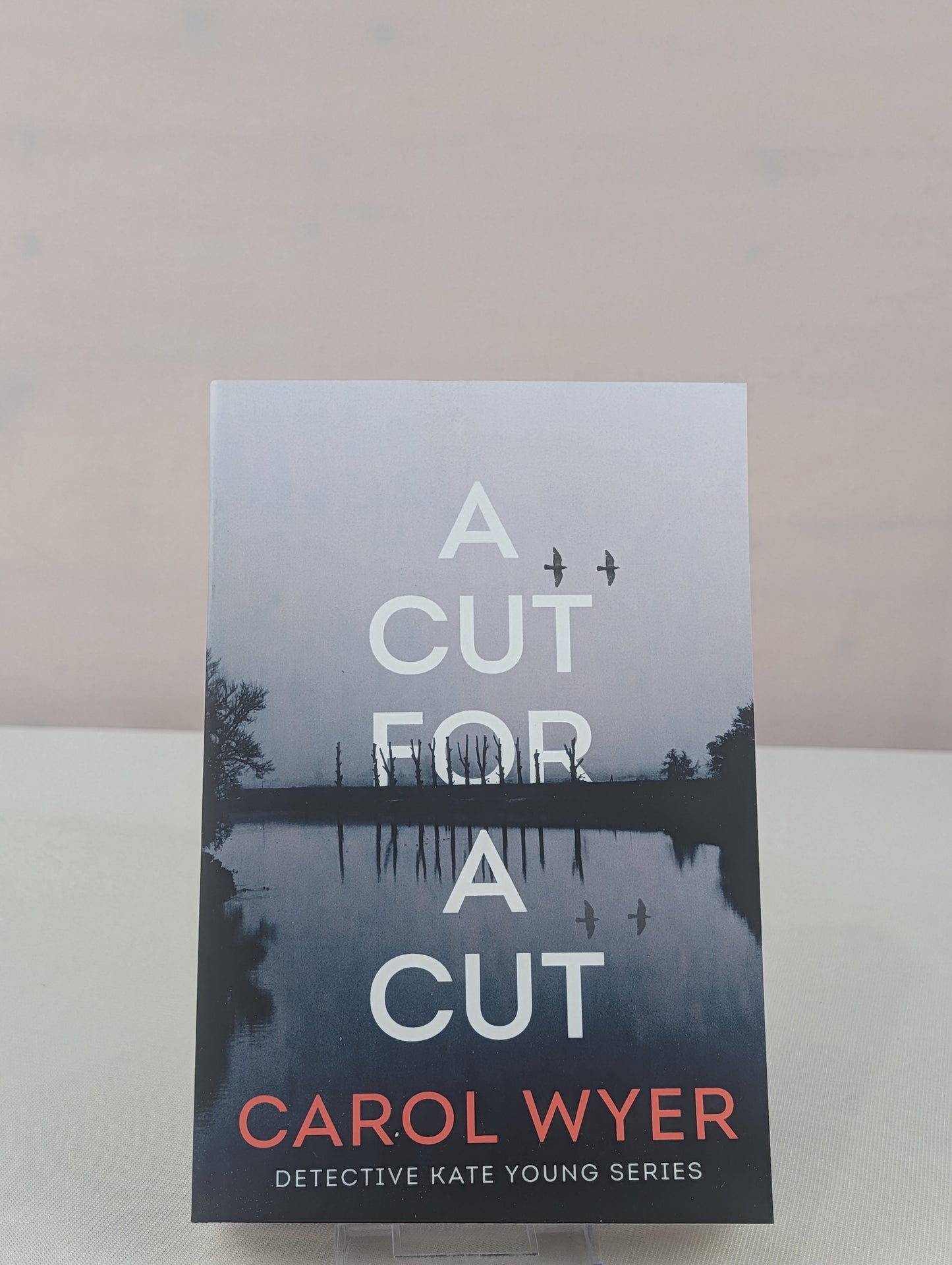 A Cut for a Cut (Detective Kate Young) by Carol Wyer