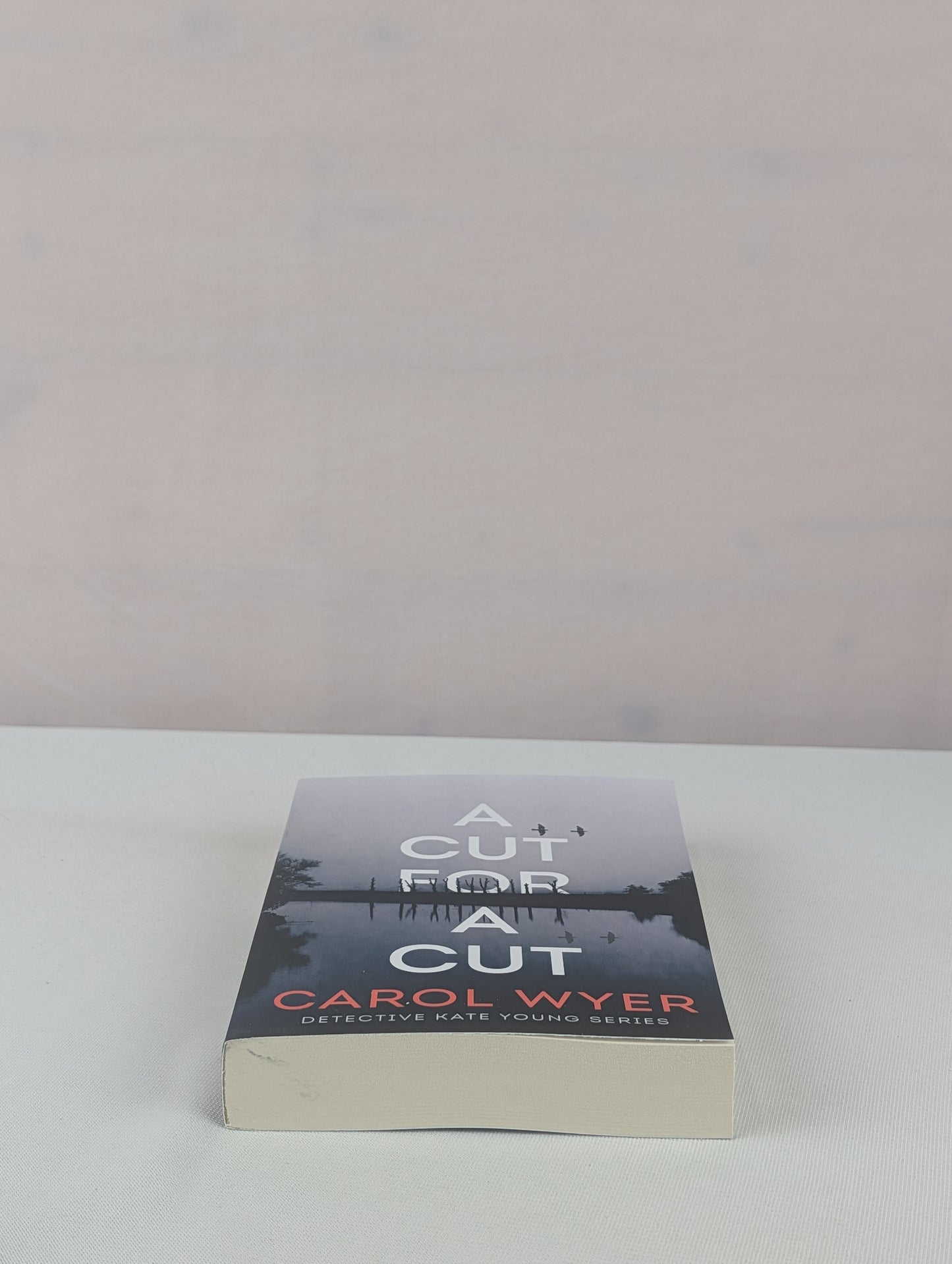 A Cut for a Cut (Detective Kate Young) by Carol Wyer