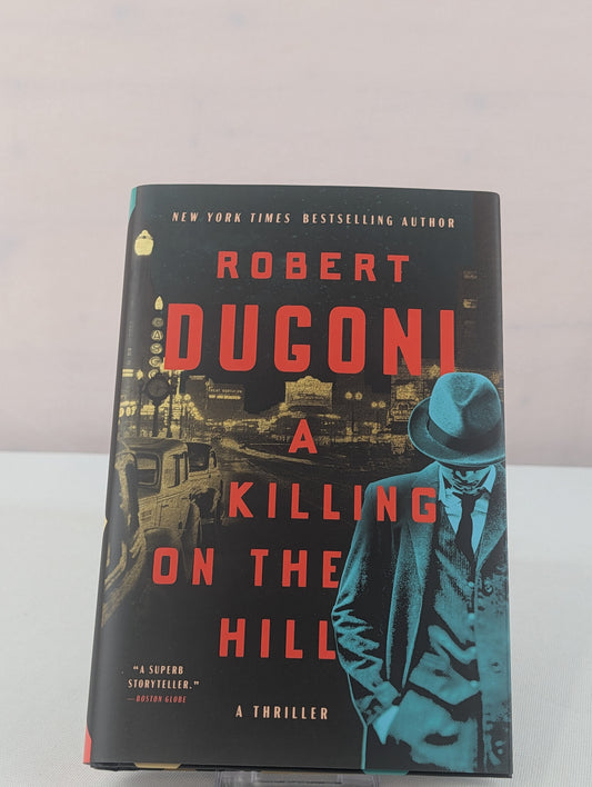 A Killing on the Hill: A Thriller by Robert Dugoni