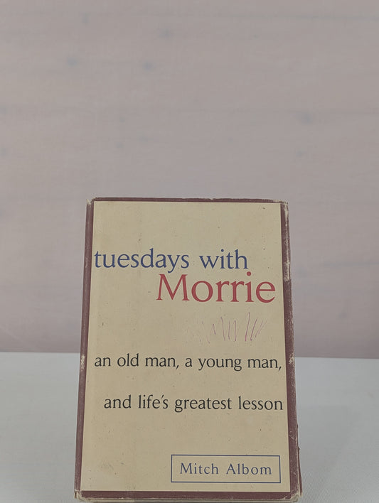 Tuesdays with Morrie: An Old Man, a Young Man and Life's Greatest Lesson by Mitch Albom